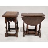 17th century-style reproduction oak occasional table, square with carved apron, on stop fluted