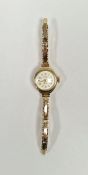 Vintage lady's Smiths 9ct gold wristwatch, the circular dial with alternating Arabic and arrow
