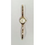 Vintage lady's Smiths 9ct gold wristwatch, the circular dial with alternating Arabic and arrow