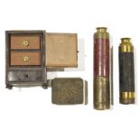 Brass three-draw red morocco bound telescope, another, a metal-mounted doll's miniature chest of