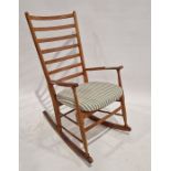 20th century oak rocking chair with ladderback, 104cm high approx.