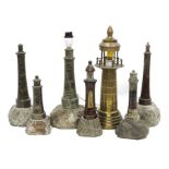 Extensive collection of Cornish Serpentine model lighthouses in various materials, to include