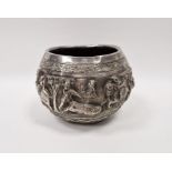 Indian white metal bowl decorated with continuing repousse scene, showing a game hunt, animals