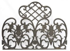 Black painted metal 20th century ornamental garden screen, fashioned with flowers and trelliswork