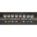 Harlequin set of hock glasses, each cup shaped bowl, coloured stem and foot in turquoise, brown,