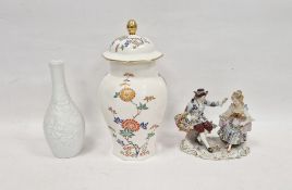 German porcelain Meissen-style figure group, circa 1900, printed blue crowned marks, modelled with a