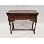 Reproduction oak side table fitted a frieze drawer with null carved front and turned knob handles,