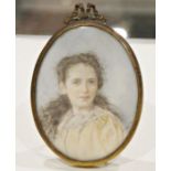 Late 19th century school, Watercolour on ivory, A portrait miniature of a young lady, signed Nina