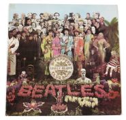 The Beatles 'Sgt Pepper's Lonely Hearts Club Band' vinyl LP, 1st pressing, mono 1967, with red on