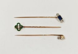 Antique gold-coloured metal, sapphire and diamond stickpin set rectangular sapphire flanked by two