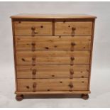 Modern pine chest of two short and four long drawers, on bun-shaped feet, 91cm high x 83cm wide x