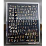 Approximately 120 Robertsons Golly badges, mounted and framed  These items are listed on the basis