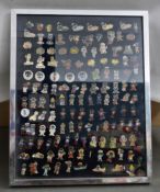 Approximately 120 Robertsons Golly badges, mounted and framed  These items are listed on the basis