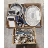Assortment of silver-plated wares to include a large selection of flatware, a silver-mounted picture