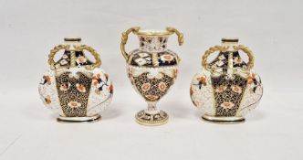 Davenport Longport Imari-pattern garniture of three vases, mid 19th century, printed iron red marks,