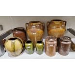 Group of stoneware storage jars and vases, 19th century and later, including two two-handled amphora