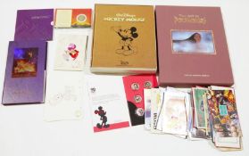 Collection of Walt Disney related ephemera including commemorative coin sets for 90 years of