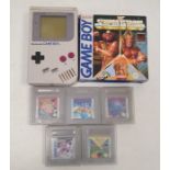 Nintendo Game Boy and six game cartridges to include Super Mario Land, Double Dragon, Blades of