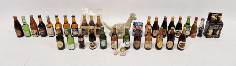 Collection of Lilliput and other miniature beer bottles including 13 Guinness, a Guinness gift pack,