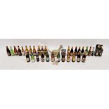 Collection of Lilliput and other miniature beer bottles including 13 Guinness, a Guinness gift pack,