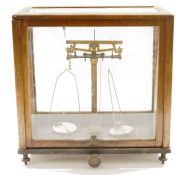 Cased set of early 20th century Griffin & Tatlock Limited chemist's precision beam scales, bearing