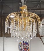 Pair of 20th century chandeliers, each having an array of cut glass hanging droplets (2) Condition