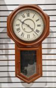 Late 19th/early 20th century polished wood drop dial octagonal wall clock by Ansonia with eight-days