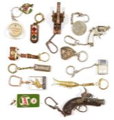 Large collection of vintage keyrings including examples for Guinness, AA, St Christopher and others