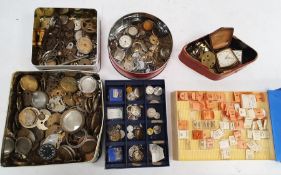 Large collection of wrist watch and pocket watch parts, dials, plates, hands and movements for