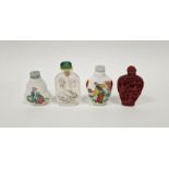 Four Chinese snuff-bottles and stoppers, comprising: a reverse glass painted snuff-bottle