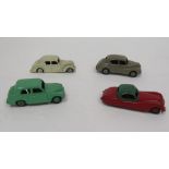 Four Dinky Toys Diecast model cars to include 157 Jaguar XK120 Coupe  red including ridged hubs with