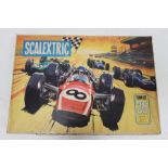 1960's Scalextric set, Team Set 35, with two cars, boxed, a controller and a catalogue, limited
