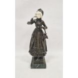 After Ferdinand Lugerth (1885-1915), a patinated bronze and ivory figure of a woman on marble