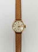 Vintage Smiths de luxe 9ct gold cased lady's wristwatch, the circular dial having alternating gilt