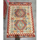 Chobi beige ground kilim with two central stepped lozenge medallions, multiple geometric borders