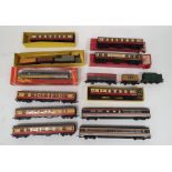 Two boxes of mainly Hornby 00 gauge railway rolling stock and accessories to include Hornby-Dublo