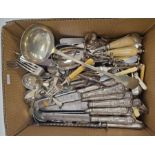 Extensive collection of silver-plated flatware and other metalware to include a large serving ladle,