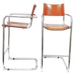 Pair of mid-century 1960’s chrome and leather bar stools, with original tan leather.Condition