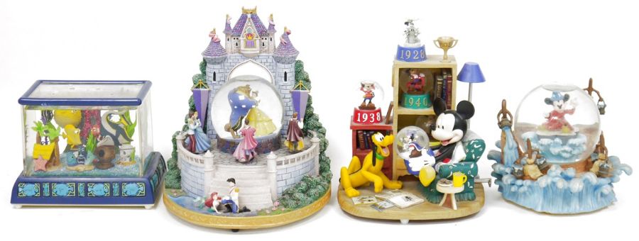 Four Disney musical snow globes to include Fantasia snow globe playing 'The...