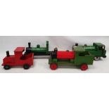 Four painted wooden locomotives to include a Green and black, a Nicoltoys green and red