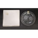 Lalique (Paris) Cristal commemorative plate, boxed, decorated with two flowers to the centre,