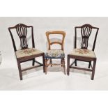 Pair of Hepplewhite style mahogany dining chairs with pierced vase splats, the drop in seats with