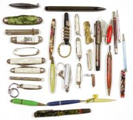 Assorted penknives, fountain pens and propelling pencils including examples in silver, bakelite