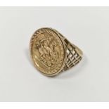 Gent's 9ct gold signet ring set with a St George medal with pierced decoration to the shank, 4.5g (