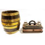 Brass bound oak barrel of coopered construction with riveted brass mounts, 30cm high and a 19th