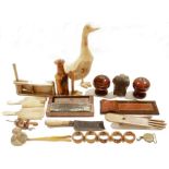 Assorted items of treen including a yew wood vase by William Stanley, 1991, assorted napkin rings, a