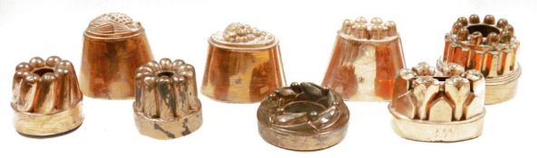Collection of late 19th/early 20th century copper jelly moulds including three marked for Colley