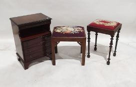 20th century mahogany bedside table with brushing slide, open recess and three drawers and two