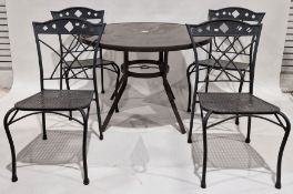 Circular metal garden table and four chairs (5) Condition ReportChairs in fair condition, stable, no