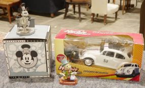 Disney Store Steamboat Willy model, a Disney Collections model of Jiminy Cricket and a Herbie